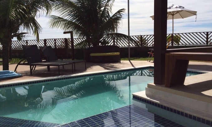 Loteamento Enseada dos Golfinhos Casa | Bungalow junto al mar con piscina privada