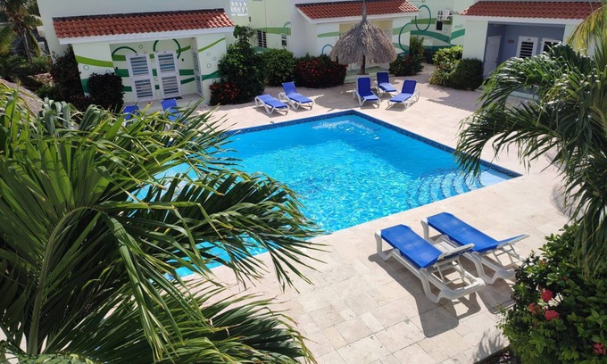 Lagun Casa | Serenity Haven: Retiro con Vista al Jardín en el Lagoon Bay"