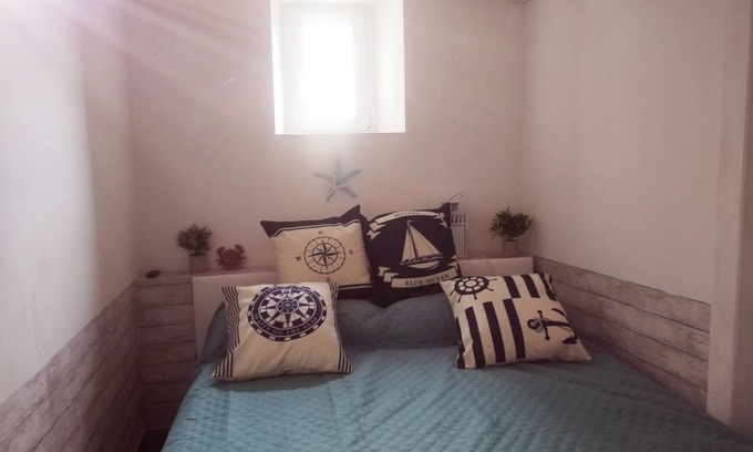 Quartiere XXXIII Lido di Ostia Ponente Apartamento | Single room with bathroom in front of the sea