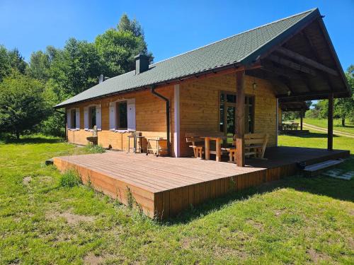 Szczecinek Casa | Single-story holiday home by the lake