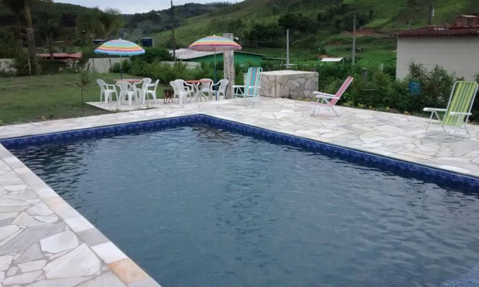Santa Isabel Casa | área de sitio en santa isabel con un campo de fútbol, piscina y ocio