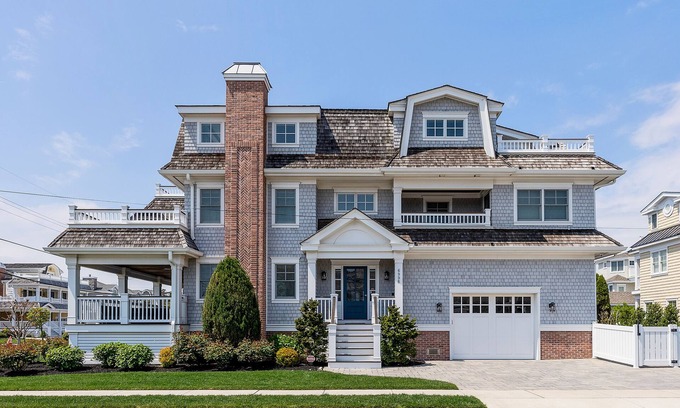 Avalon Casa | Spacious deck has ocean views as home is across the street from the beachblock.