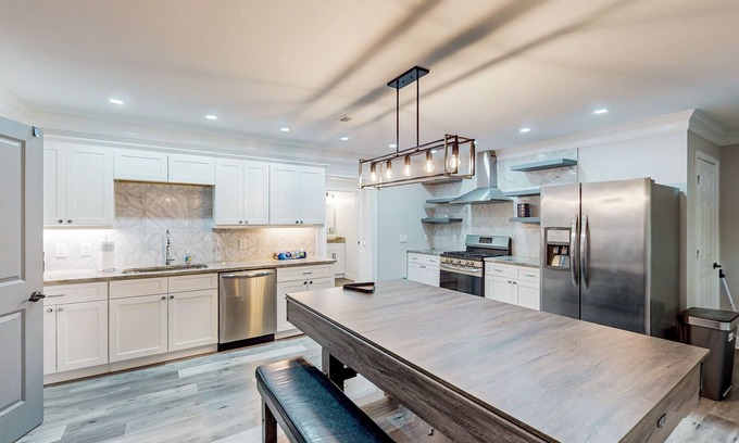 Roswell Casa | Spacious, dog-friendly home with home theater, game room & 2 kitchens