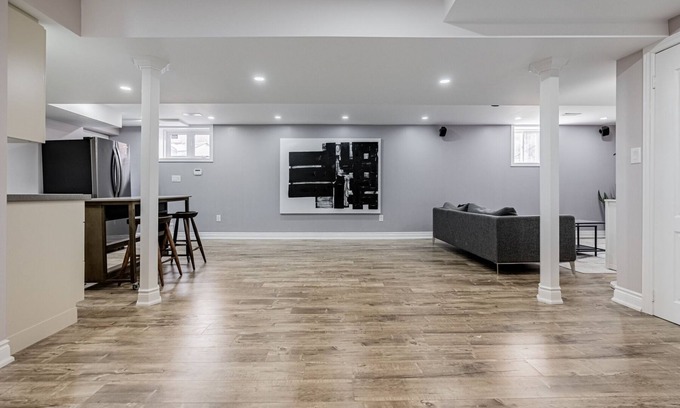 Brampton Casa | Spacious guest suite with ravine views