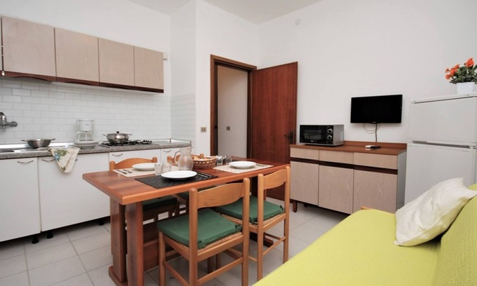 Lignano Riviera Apartamento | Amplia casa de vacaciones en una ubicación cómoda.