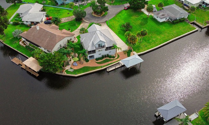 Dixie Shores Casa | Spacious Waterfront Luxury Home w dock, kayaks & bicycles bring your boat!