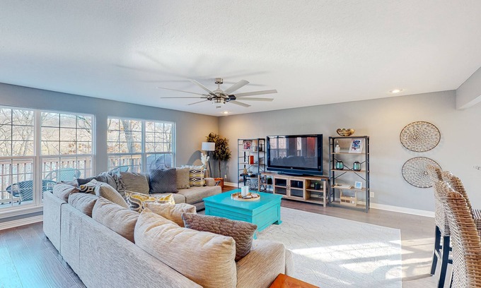 Garfield Casa | Spacious waterfront home with a washer/dryer, central AC & deck