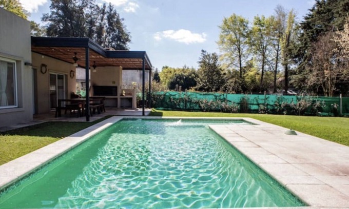 Del Viso Chalet De Esquí | Special home for Holidays pool and green park