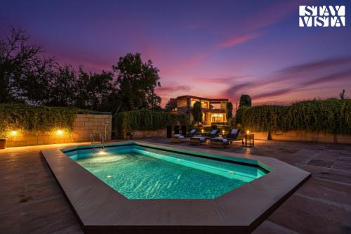 Dwarka Villa | StayVista at The Cityscape With Outdoor Pool
