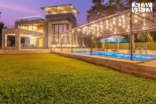 Kune Village Villa | StayVista's Greystone Estate with Pool, Terrace, and Snooker Table