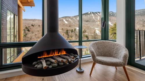Stowe Area Apartamento | Stowe Mt Resort Treehouse Ski in Ski Out Mt Views By Stowe Mountain Rentals