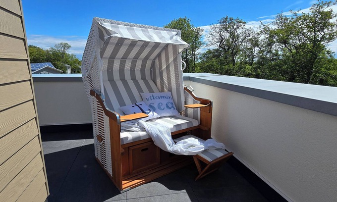 Tossens Apartamento | StrandGut 49 - Penthouse with a view. Sauna. Roof terrace. Exclusive.