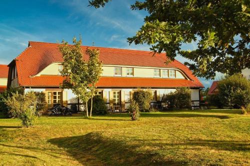 Kreptitz Apartamento | strandnahe Ferienwohnung mit eigener Terrasse - Feriendorf Bakenberg FeWo D06