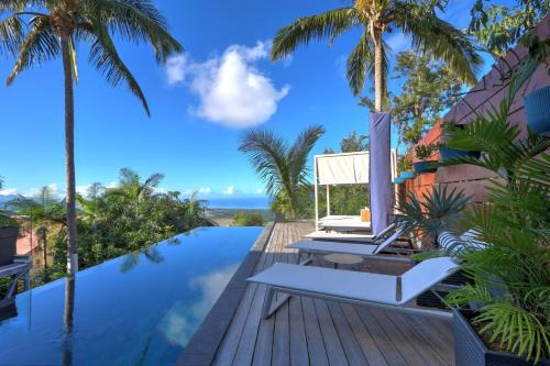 Les Avirons Apartamento | Studio Ananas - Vue mer et piscine partagée