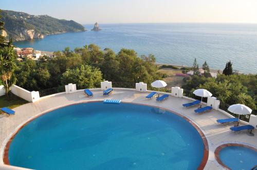 Agios Gordios Apartamento | Studio apartments with pool maria in Agios Gordios Beach