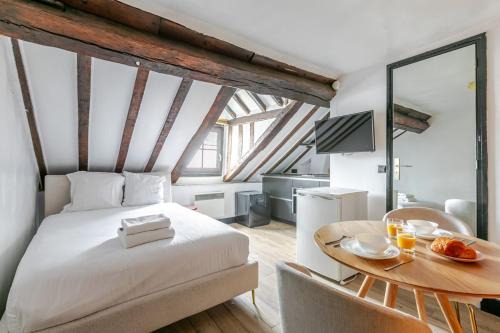 Saint-Thomas-d'Aquin Apartamento | Studio cosy pour 2 au cœur de Paris