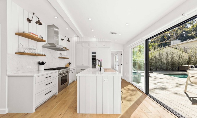 Beachwood Canyon Casa | Stunning compound w/pool house features quintessential LA indoor/outdoor living