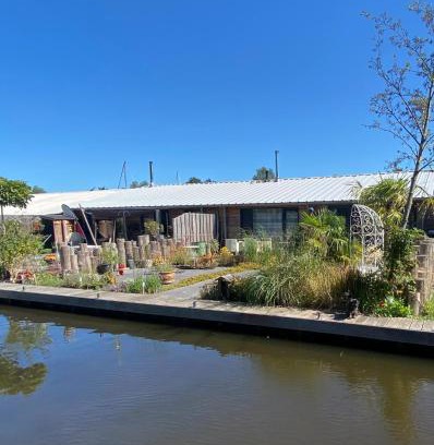 Aalsmeer Casa | Stunning Island Home with African Asian Vibe