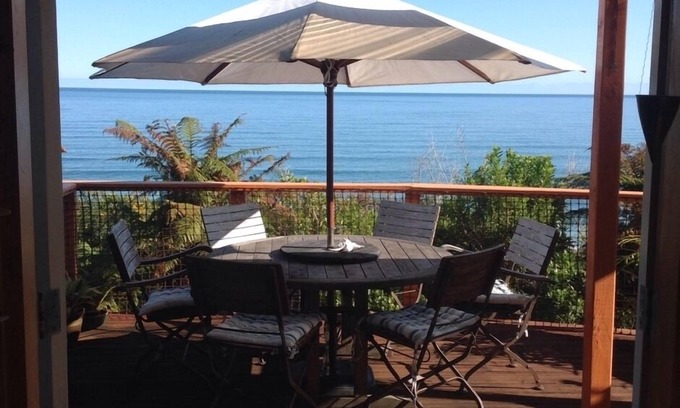 Paparoa National Park Casa | Impresionantes vistas al mar, puestas de sol en una romántica y acogedora casa de vacaciones Kiwi