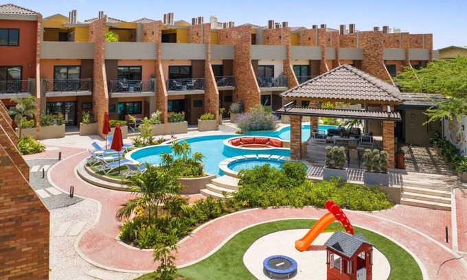Tuscany Residence Aruba Apartamento | Stylish 3BR Villa Steps from the Beach at Porta Al Sole 4 by Bocobay