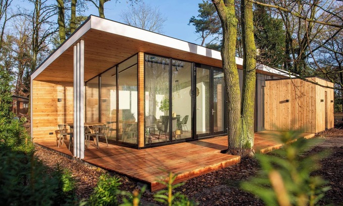 Maasbree Casa | Stylish forest cottage with private sauna and hot tub, surrounded by greenery. Ideal for couples or families seeking peace and wellness.