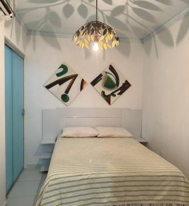 Mariricu Casa | Suíte Sol e Lua Guriri - Conforto a 80m da Praia de Guriri