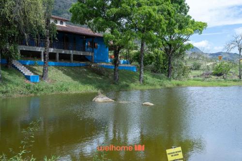 Macae Apartamento | Suite em Macae com vista lago e piscina