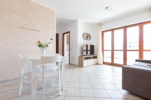 Fiumicino Apartamento | Suite Moderna 60 m2 con terrazzo privato - 5 min da Aeroporto FCO e Fiera di Roma