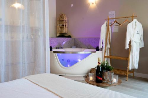 Nemours Apartamento | Suite sensuelle balnéothérapie et fauteuil tantra