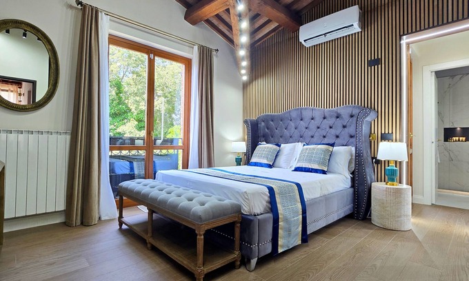 Manciano Apartamento | Suite with private bathroom and views of Tuscan hills
