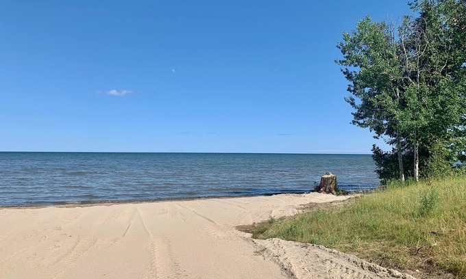 Escanaba Casa | Sun Rise Shores. Private. Hot tub over looking Lake Michigan.