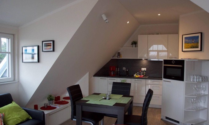 Wangerooge Hotel | Solárium en el cobertizo: exclusivo apartamento en la playa del Mar del Norte