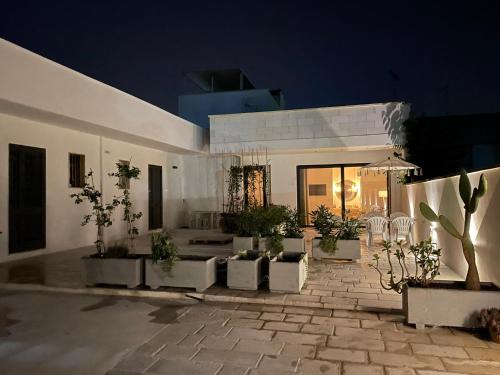 Torre Lapillo Apartamento | "SUPER" a Torre Lapillo a 30 dal centro a 80 mt dalla spiaggia Casa Dario, disponibile NAVETTA per l'aereoporto GRATUITA