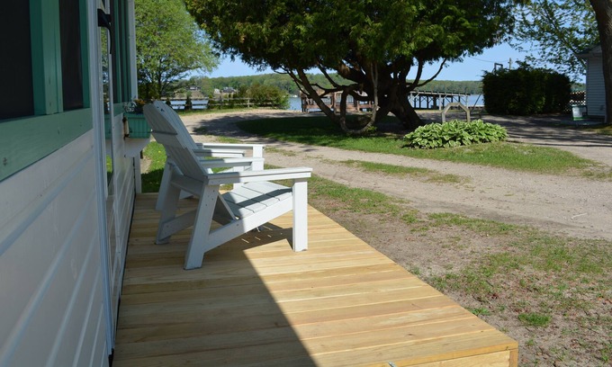 Ludington Cabaña | Swan on the Lake with Kayaks, lake frontage, fire pit and screened in porch