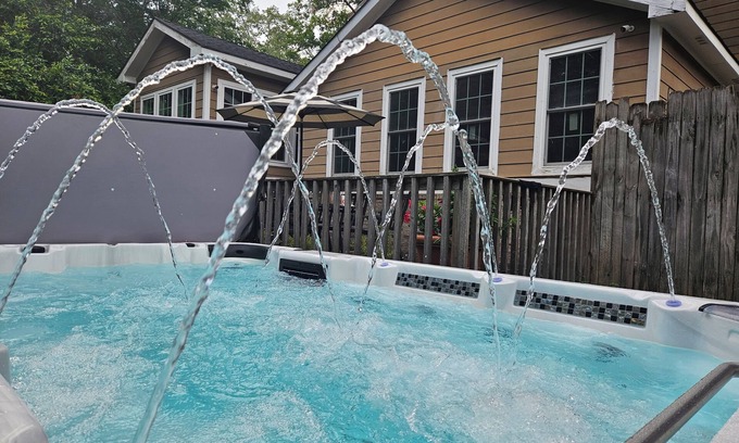 East Side Casa | Swim-Spa, 75" TV 4Movie Nights, Close2Downtown/Walk2 Restaurants/Shops, Sleeps16