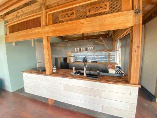 Sani Villa | Tamari House, a mansion with coral islands and natural pools