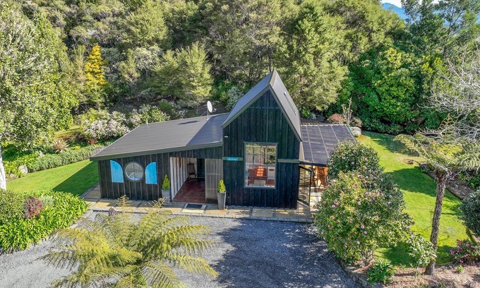 Hikuai Cabaña | La cabaña en la colina