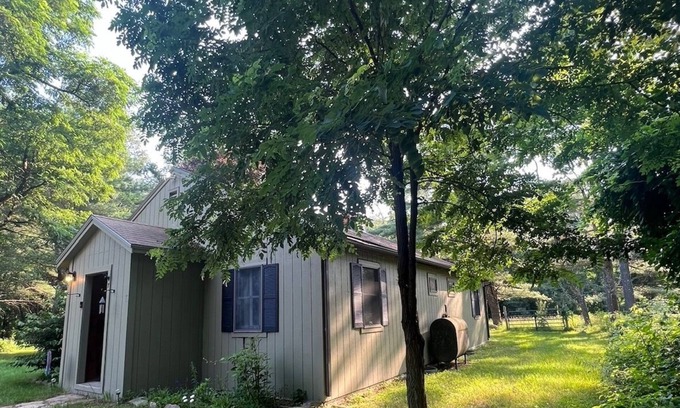Center Tuftonboro Cabaña | The Cowbell Cottage! Cozy, dog friendly & nestled in the Lakes Region of NH.