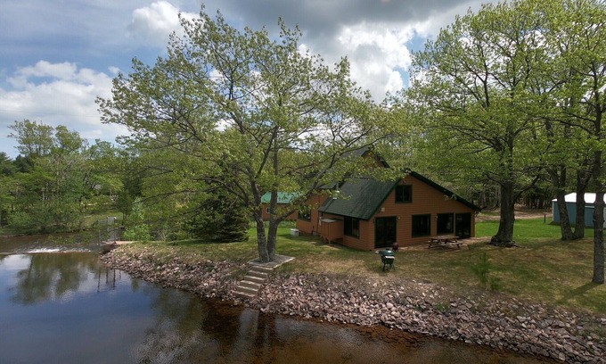 Big Bay Casa | "The Dam House" Lake and River Front Home with Beautiful Sunset Views