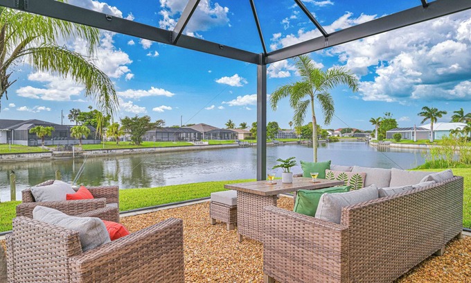 Fort Myers Casa | The Lily Pad + Waterfront + Pool + Golf Simulator + Movie Theater