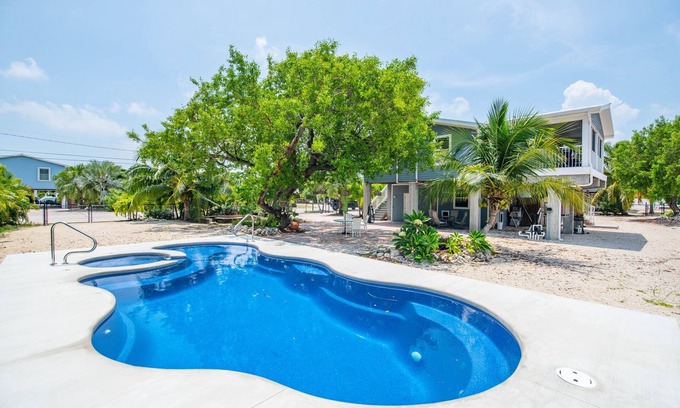 Breezeswept Beach Estates Casa | The Orchid House, 5 bed/2bath Canal Front Home, Ramrod Key