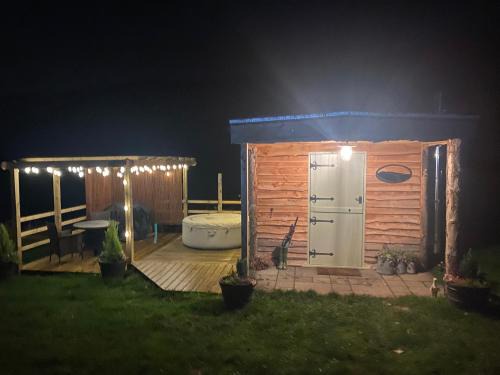 Pen-y-cae Casa | The original Sleeping Giant Lodge with hot tub & Alpacas