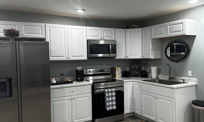 Aurora Casa | The room has bathroom and king size bed and a shared living room. Super cozy!