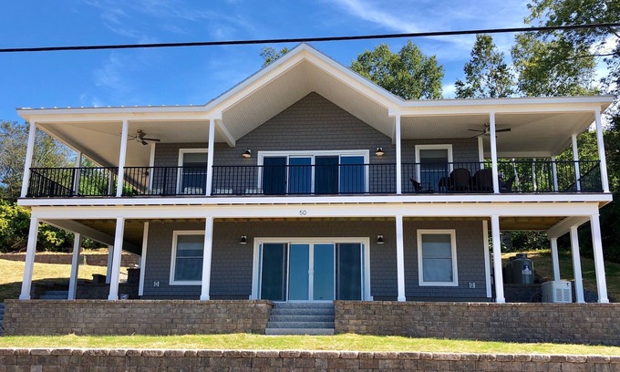 Mid-Coast and Islands Casa | This spacious home offers a FANTASTIC covered porch, perfect to spend your days gazing at the ocean!