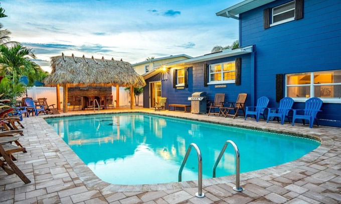 Cocoa Isles Casa | TIKI BLUE: 5 BedRm Beach House: Heated Pool + Hot Tub + Tiki Bar