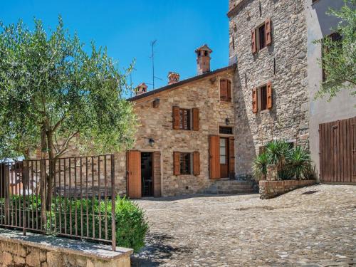 Ca' de' Grimaldi Casa | Tranquil Village Stay with Fireplace