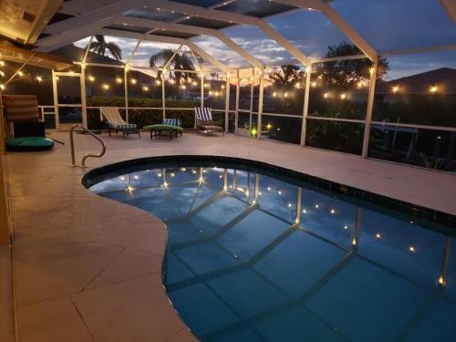 Cape Coral Casa | Tropical Breeze Canal Waterfront Home, Heated Pool