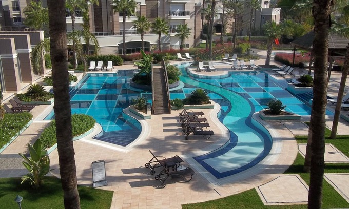 Side Apartamento | JARDINES TROPICALES E 7; espacioso dúplex de 4 camas