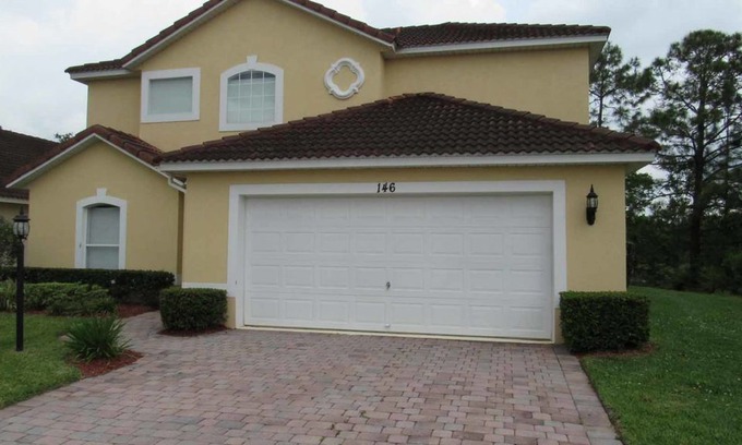 Lake Wilson Preserve Casa | Two story, spacious 4/3 Pool Home at Lake Wilson Preserve. Backed to a conservation area for enhance