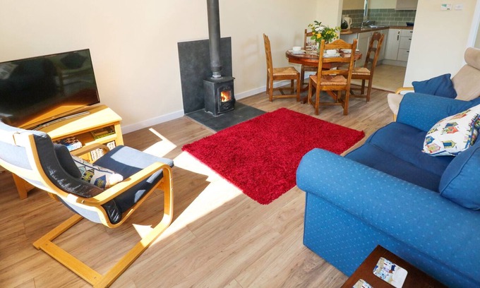 Pendine Cabaña | TY'R ARDD, admite mascotas, con chimenea en Pendine, Ref 984541
